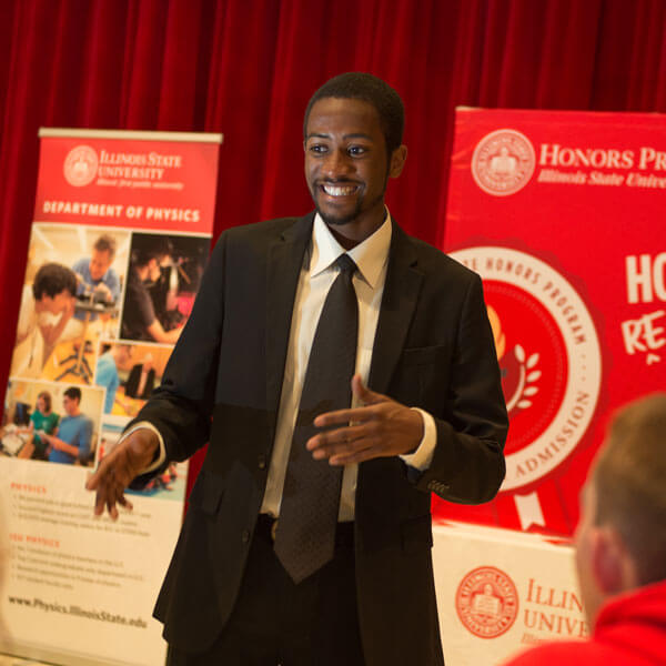 A scholar gives a talk to honors students.